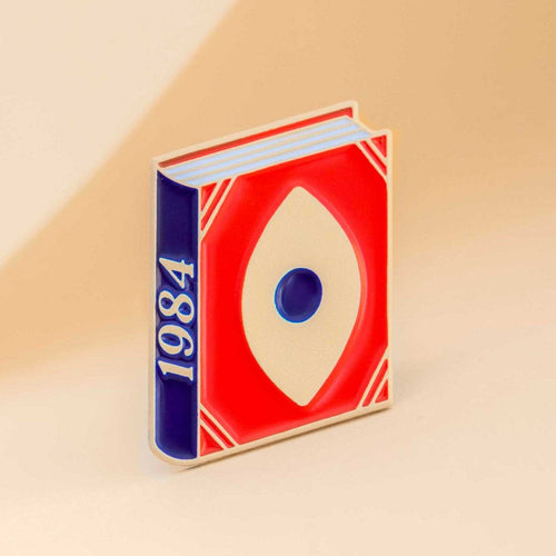 1984 enamel book pin for independent bookstores and concept shop, illustration by Judy Kaufmann