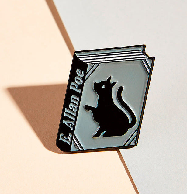 E. Allan Poe enamel book pin for independent bookstores and concept shop, illustration by Judy Kaufmann