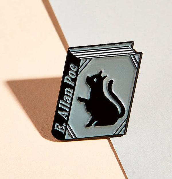E. Allan Poe enamel book pin for independent bookstores and concept shop, illustration by Judy Kaufmann