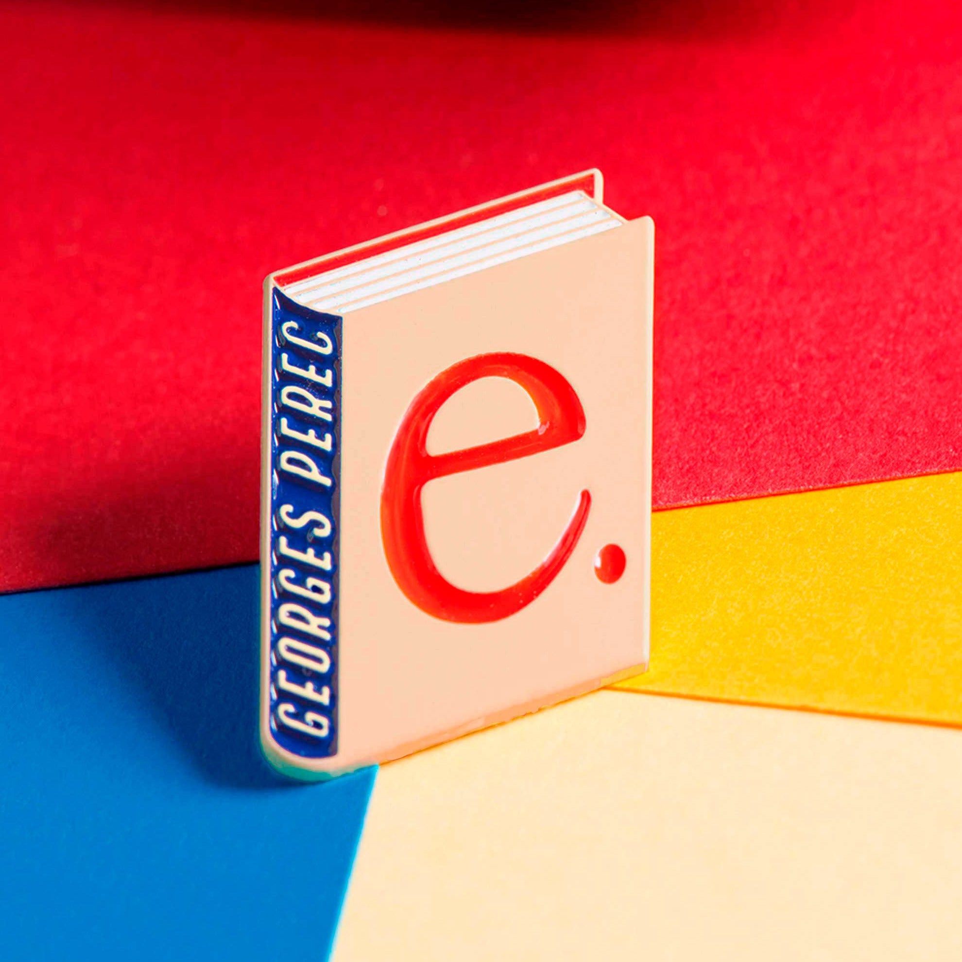 Georges Perec enamel book pin for independent bookstores, illustration by Judy Kaufmann
