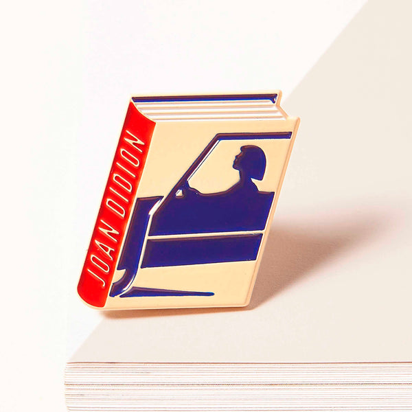 Joan Didion enamel book pin for independent bookstores, illustration by Judy Kaufmann