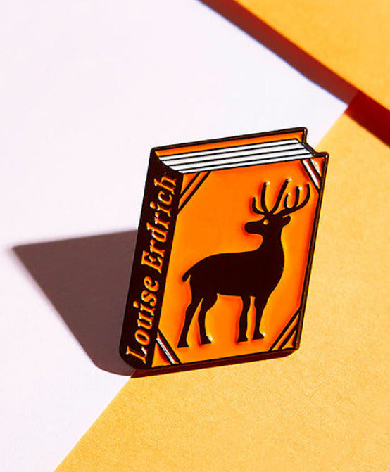 Louise Erdrich enamel book pin for independent bookstores and concept shops, illustration by Judy Kaufmann