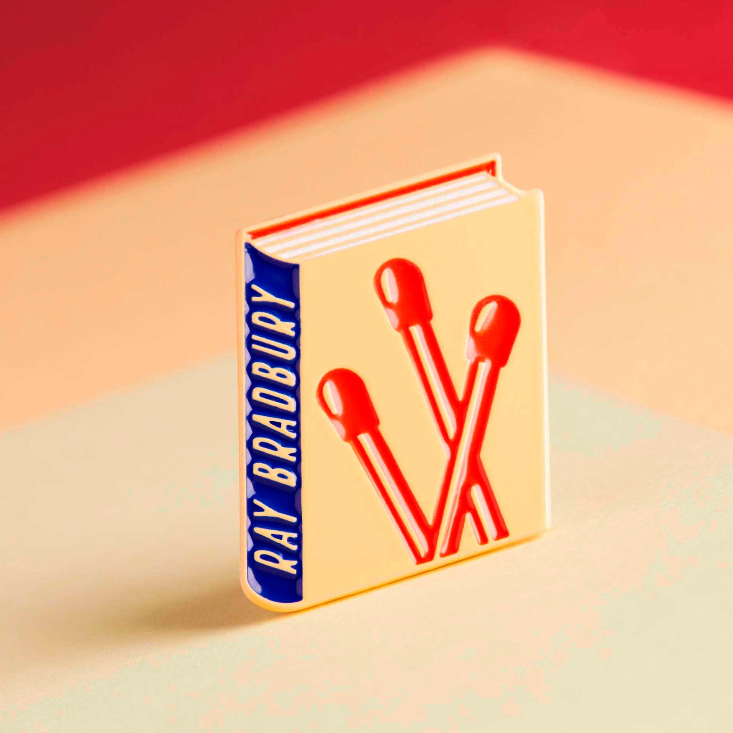 Ray Bradbury enamel book pin for independent bookstores, illustration by Judy Kaufmann