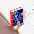 Rebecca Solnit enamel book pin for independent bookstores, illustration by Judy Kaufmann