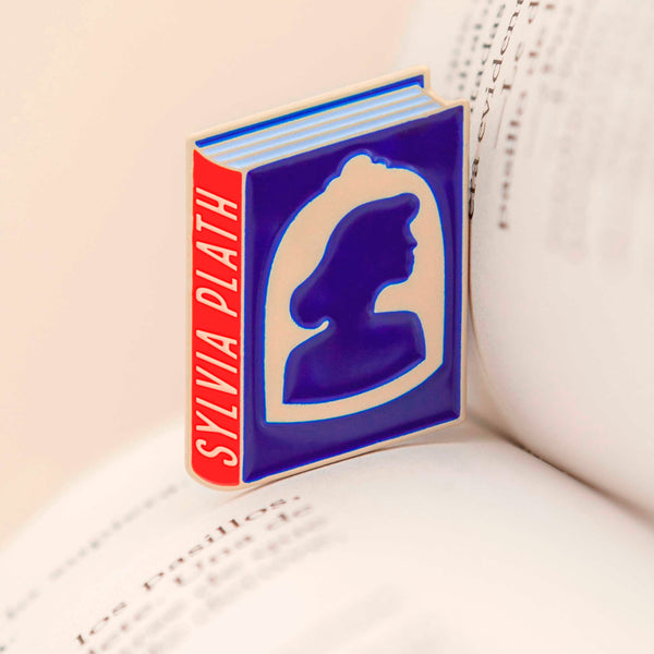 Sylvia Plath enamel book pin for independent bookstores and concept shop, illustration by Judy Kaufmann