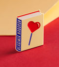 Vladimir Nabokov enamel book pin for independent bookstores, illustration by Judy Kaufmann